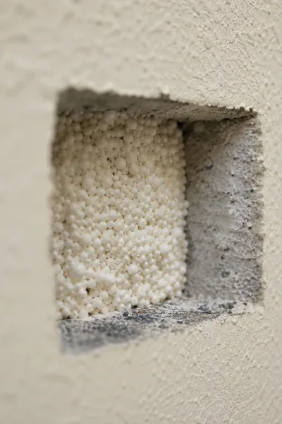 Cavity wall insulation bead injection